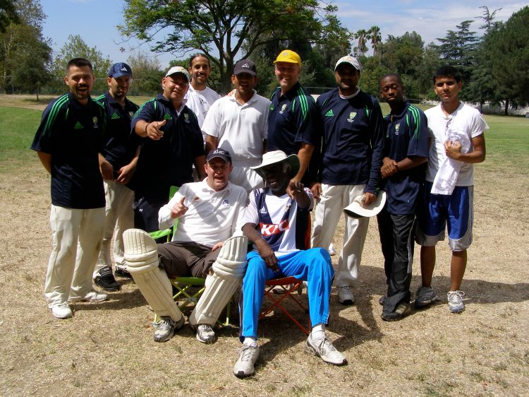 Custard and The Rev celebrate post game with Ted Hayes and the Compton Cricket Boys