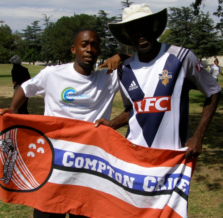 Ted and Brian wearing their Bushrangers and Credo Cricket shirts